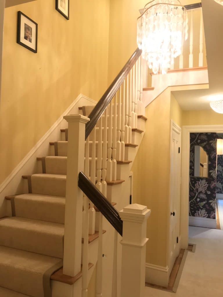 Wrapping staircase finished with carpet