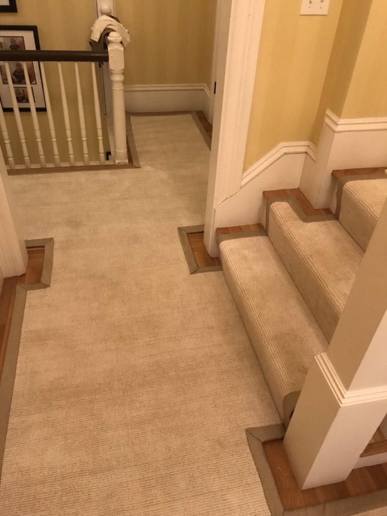 Custom cut carpet in the hallway and the stairs
