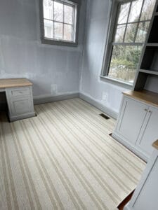 Area rug is custom cut to fit into this living room space