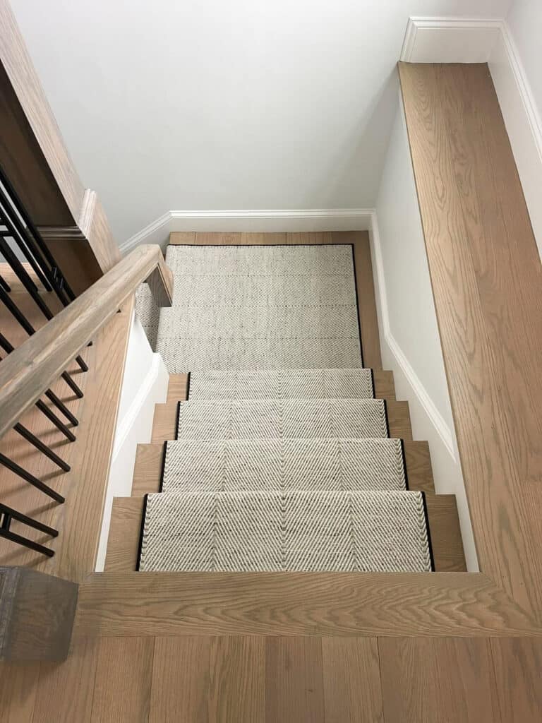 Martinique silver area rug with narrow cotton binding finish, a sustainable carpet option