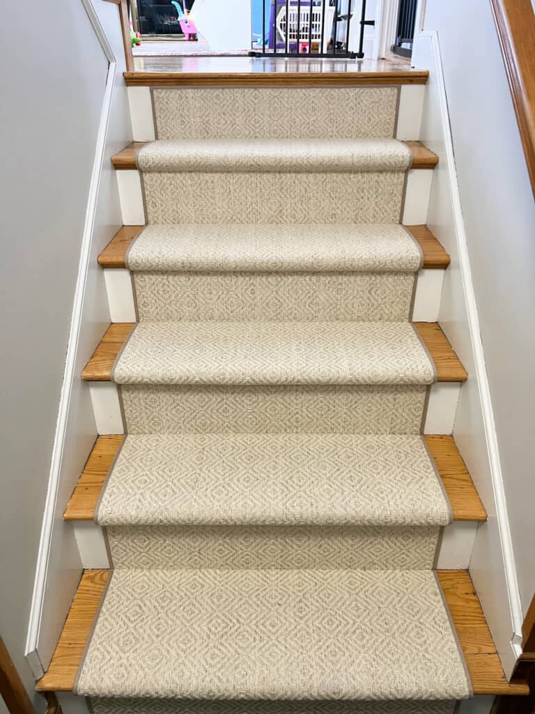 Necker Island wool stair runner installed hollywood style