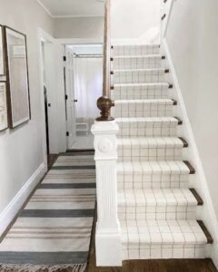 Stair runner and hallway runner with no match, homeowner used a different styles used for a custom and personalized look.