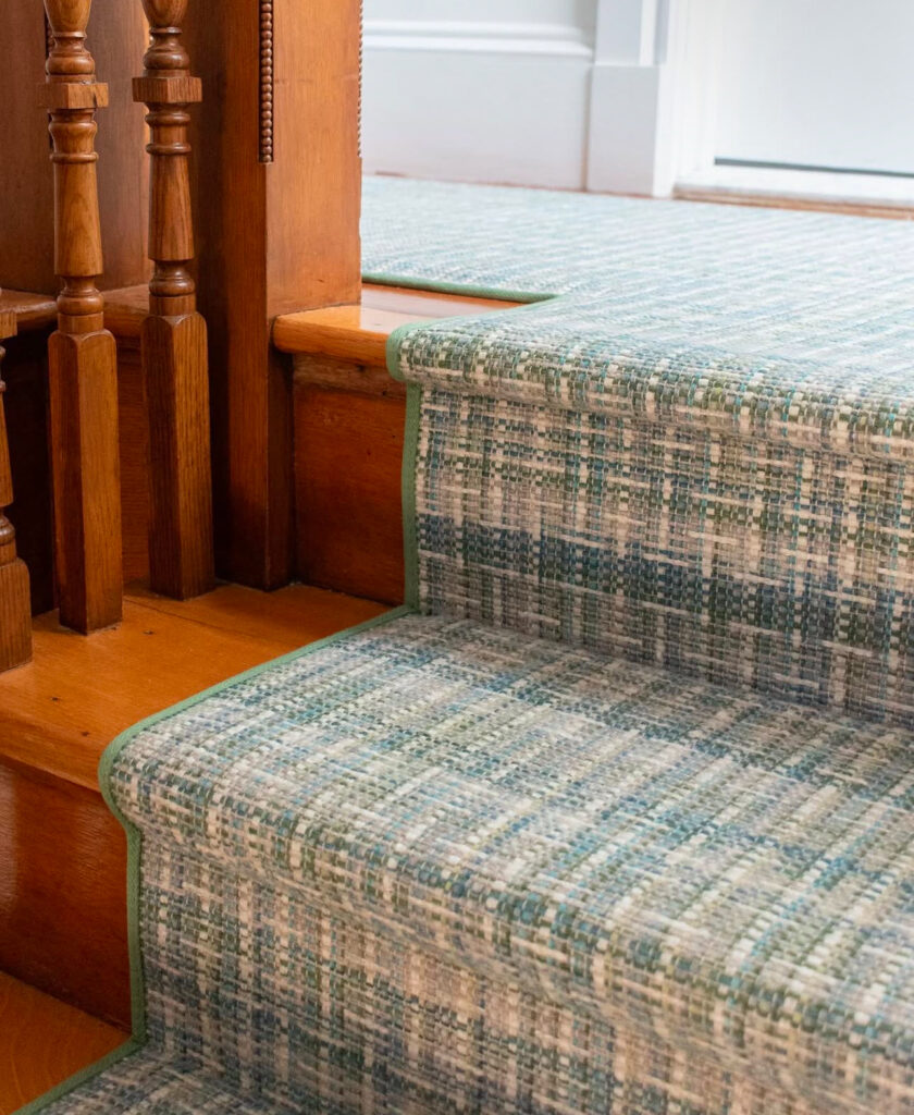 Teal blue stair runner with modern pattern and Hollywood style install