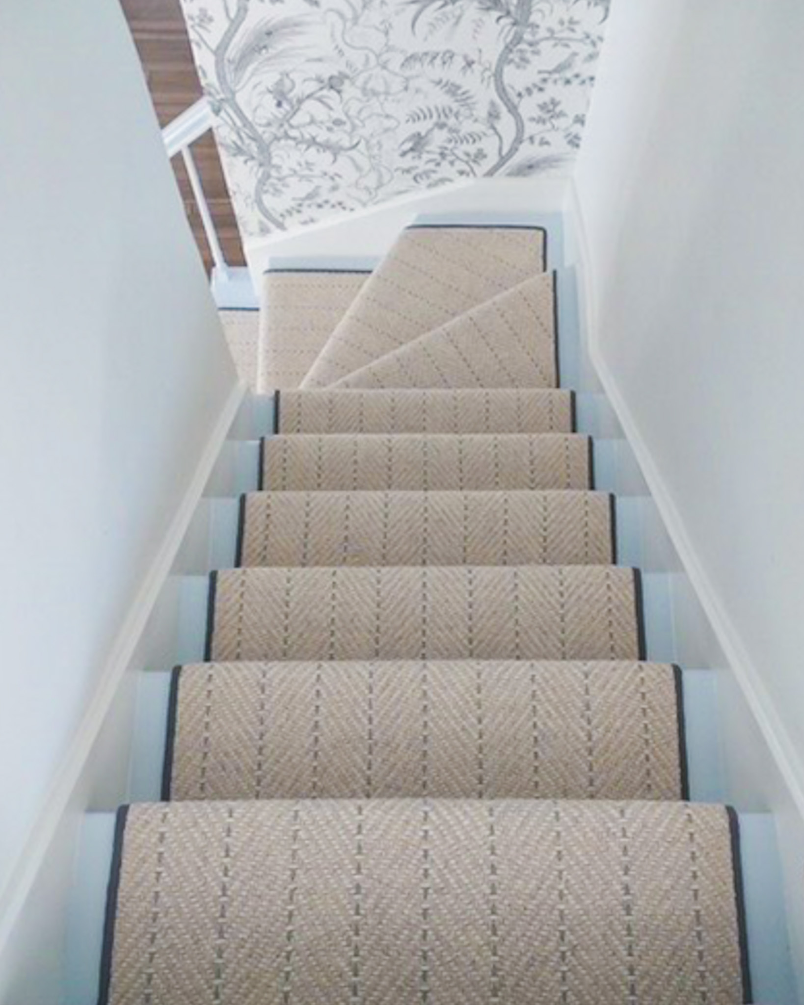 custom stair runner with light blue stitching. Stanton Carpet.