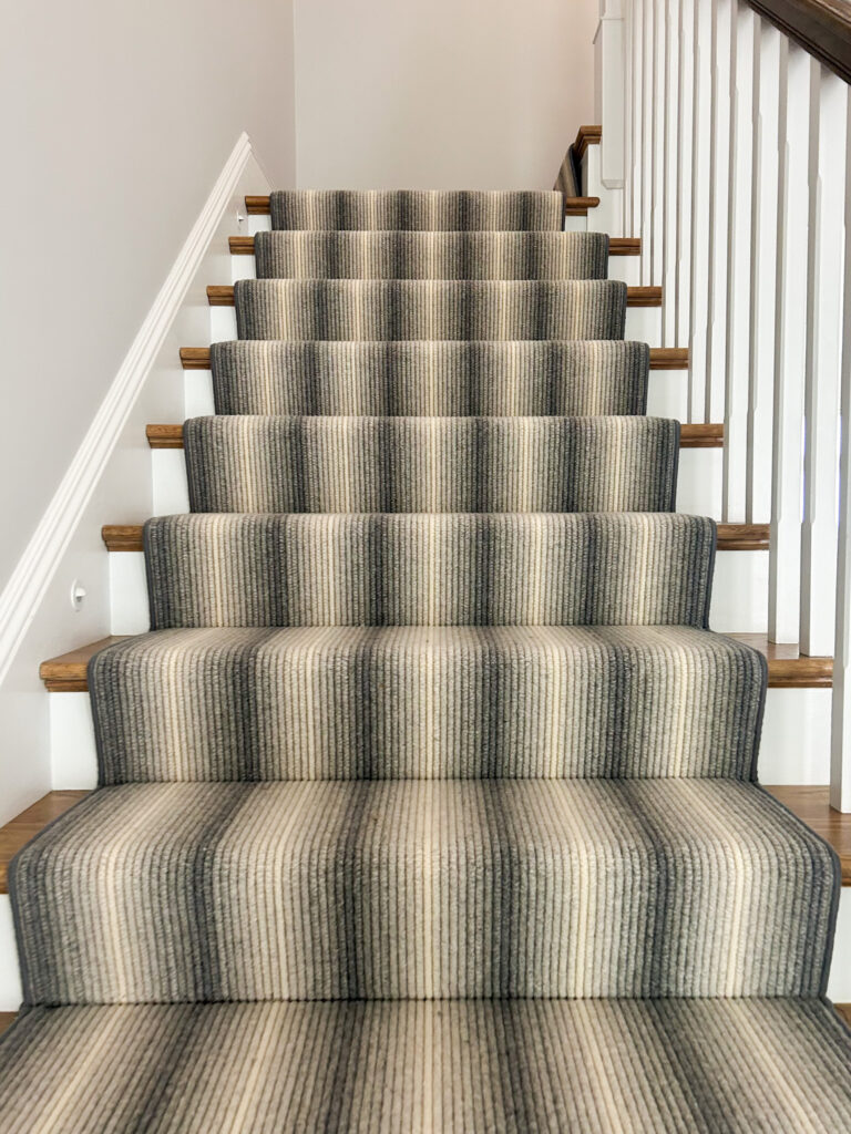 Contemporary home styled with a custom stair runner